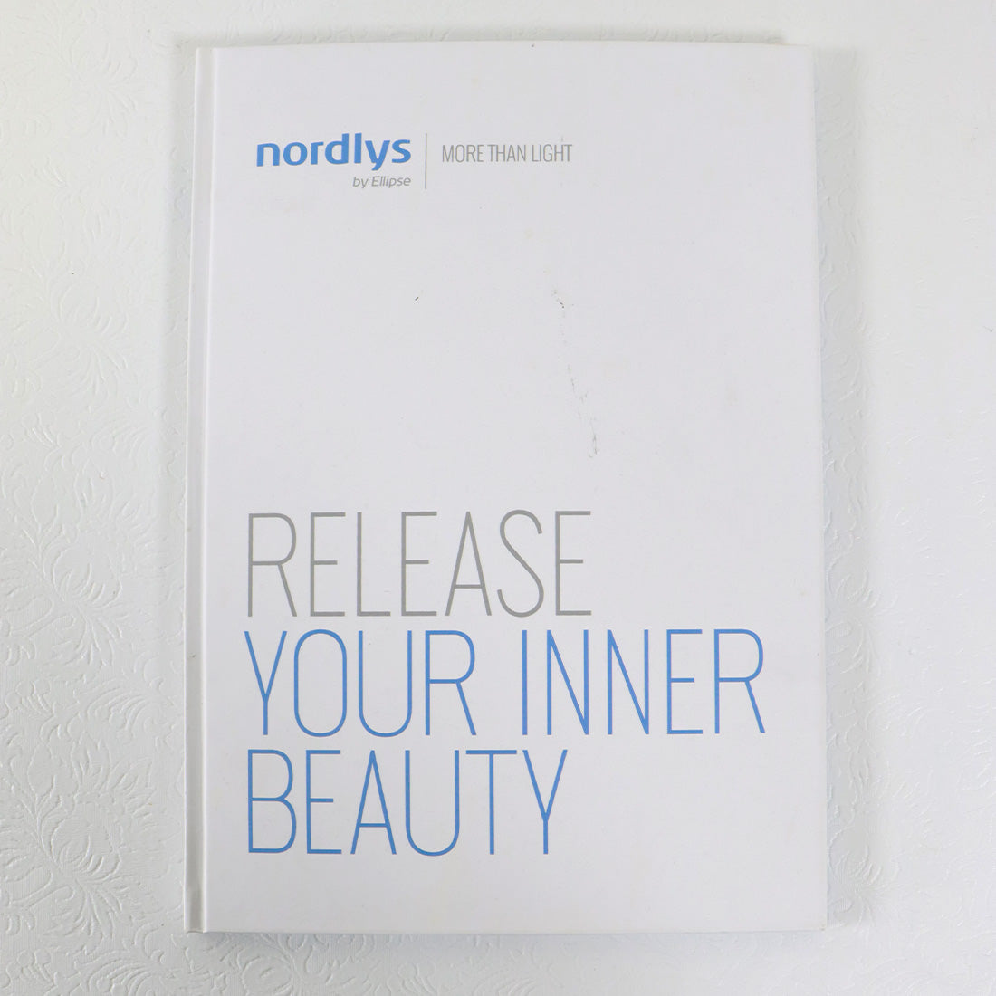Candela Nordlys Ellipse 'Release Your Inner Beauty' Before After Marketing Book