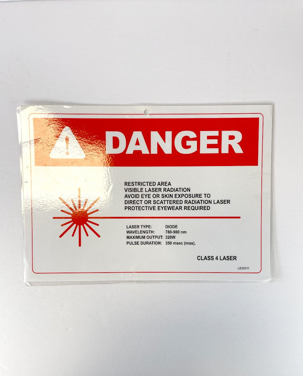 DANGER RESTRICTED AREA VISIBLE LASER RADIATION AVOID EYE OR SKIN EXPOSURE TO DIRECT OR SCATTERED RADIATION LASER PROTECTIVE EYEWEAR REQUIRED CLASS 4 LASER LB39311