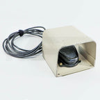 ConBio MedLite IV Q-Switched foot pedal with beige metal guard and black coiled cable