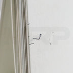 Close-up of minor pen marks on Sciton binder cover near spine