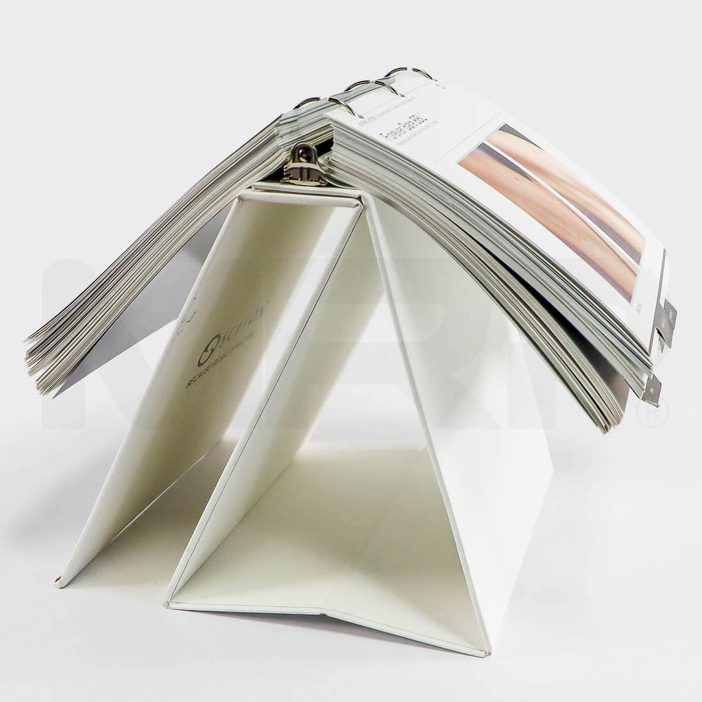 Sciton easel binder with before & after pages flipped open over the rings