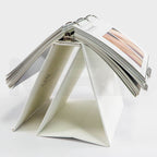 Sciton easel binder with before & after pages flipped open over the rings
