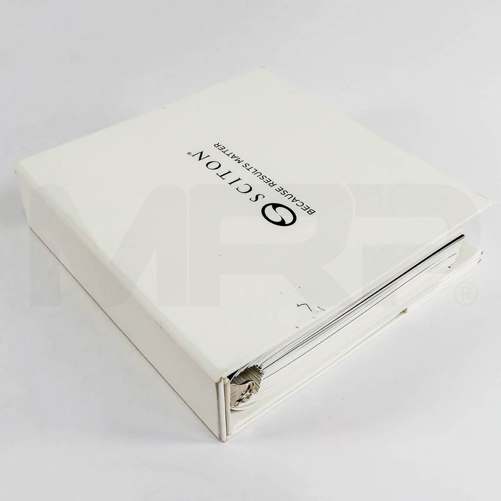 Sciton white ring binder closed, cover with Sciton logo