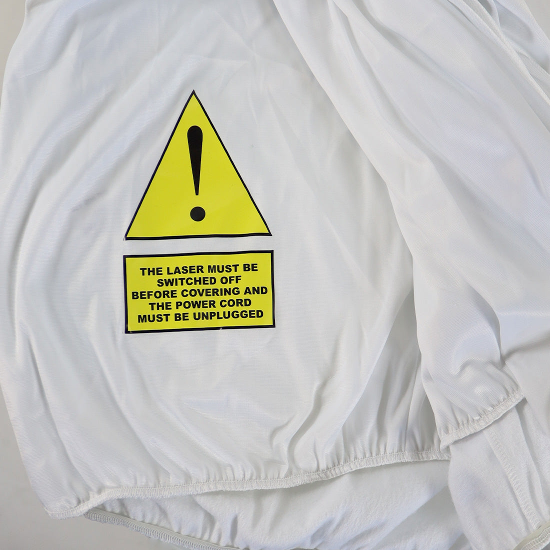 Quanta Systems Laser in Our DNA White Polyester Cover